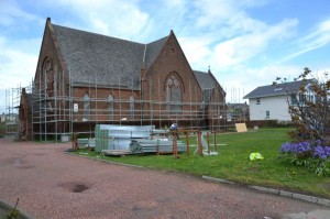 scaffolding coming round the front